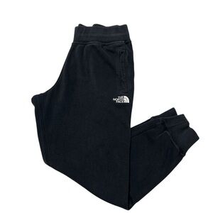 The North Face Black Sweatpants with Tapered Fit and Logo
